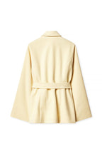 Beige coat on a white background